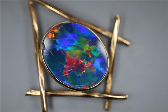 A black opal doublet pendant on 9ct chain